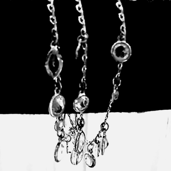 Carolee Jewelry - Vtg. Costume silvertone 3 strand  rhinestone bracelet